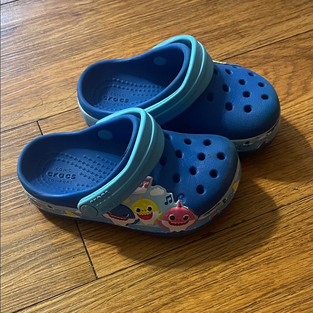 CROCS Kids Blue and Teal Clogs with Fun Characters